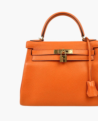 Hermès Kelly 25 Clemence Orange Retourne GHW