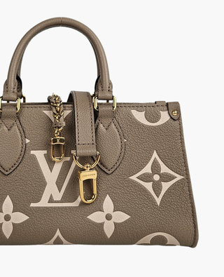 Louis Vuitton OntheGo East West Bicolour Monogram Empreinte Leather