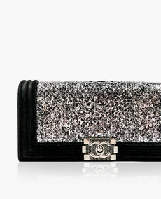 Chanel Boy Flap Clutch hopea Python Leather Black