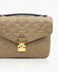 Louis Vuitton Pochette Metis Monogram Empreinte Leather Dune