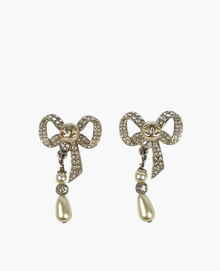 Chanel Ribbon Earrings Silver Stones