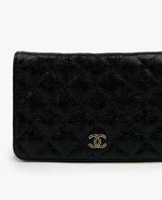 Chanel WOC Black Lambskin Camelia GHW