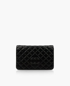 Chanel WOC Black Lambskin tikattu CC