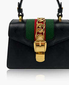 Gucci Sylvie Top Handle musta nahkalaukku