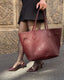 Louis Vuitton Neverfull MM Empreinte Leather Grenat